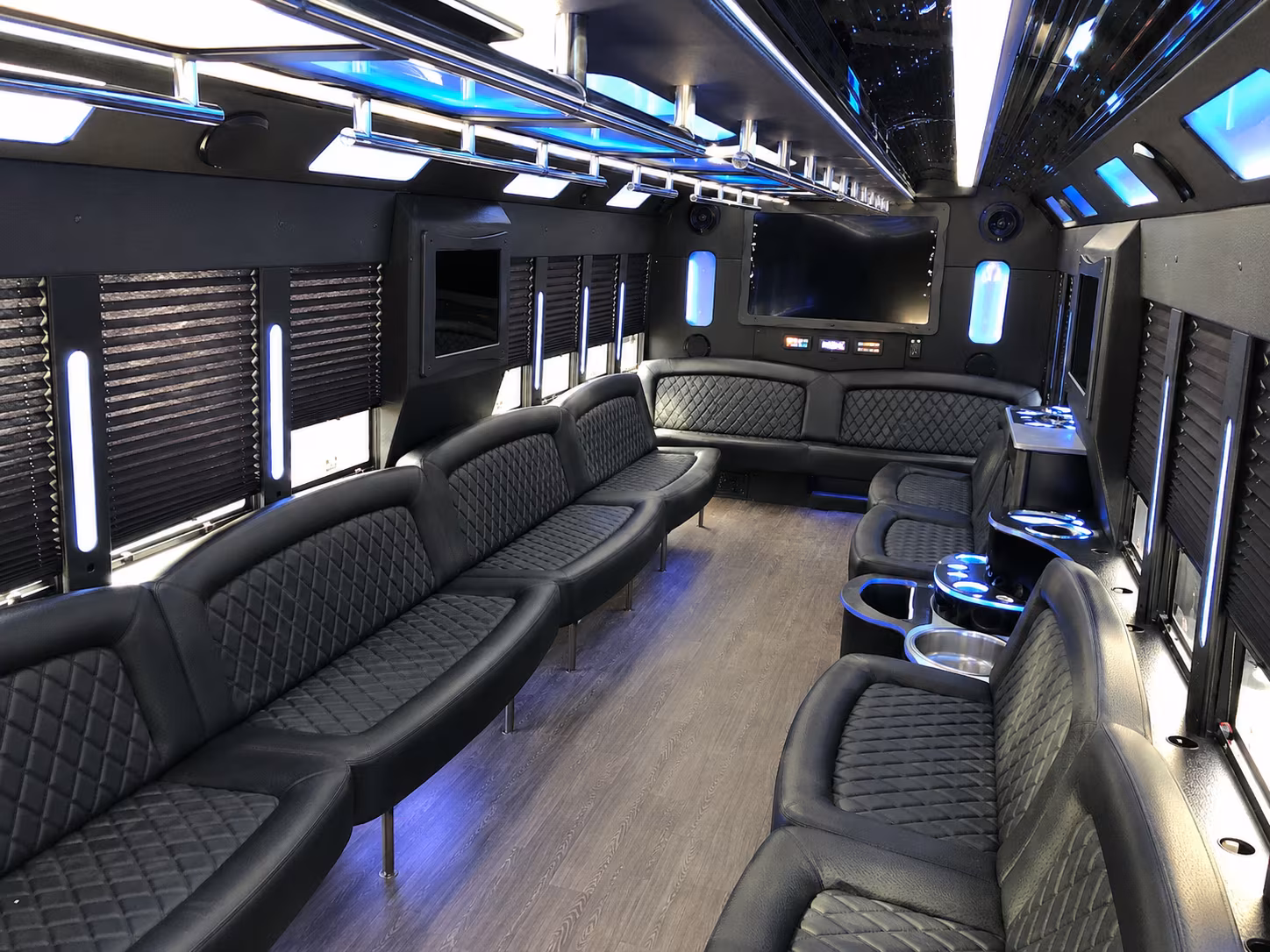 Wedding guests seated inside a party bus serving Louisville